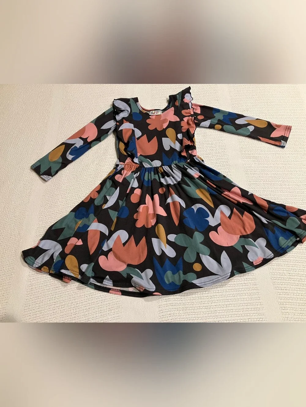 $4 If Bundled. Girls Black Floral Dress with Pink & Blue Accents